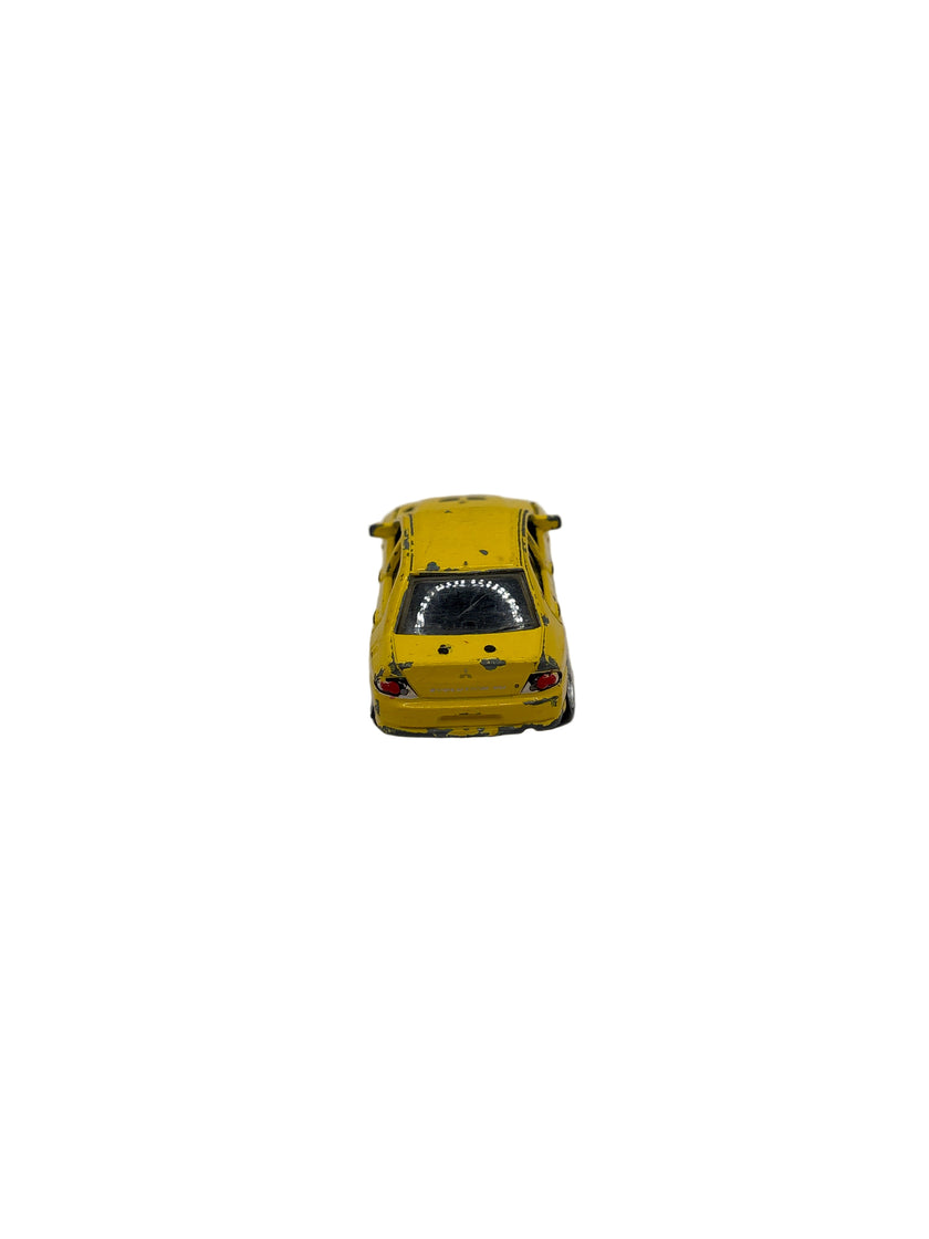Racing Champions 2002 Mitsubishi Lancer Evolution VII Diecast yellow