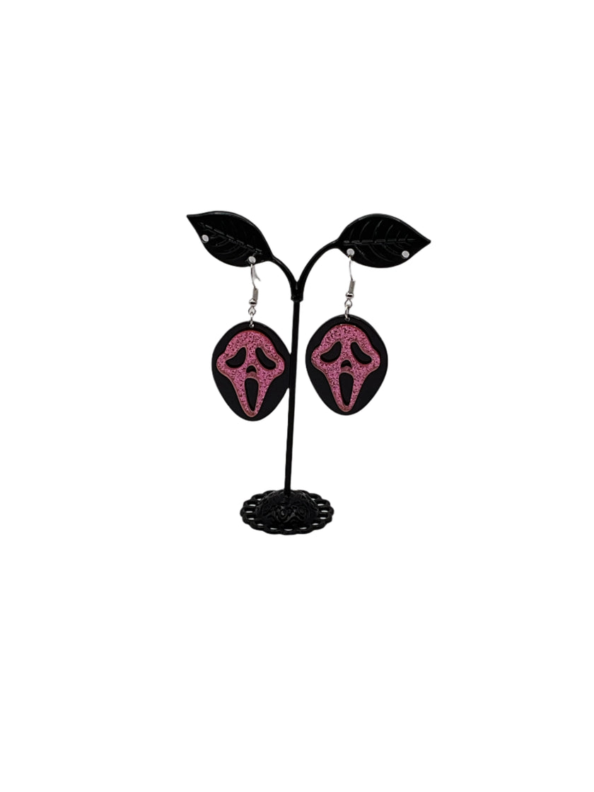 Pink and black scream earrings