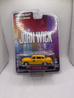 Greenlight 1974 Checker Taxi Diecast yellow