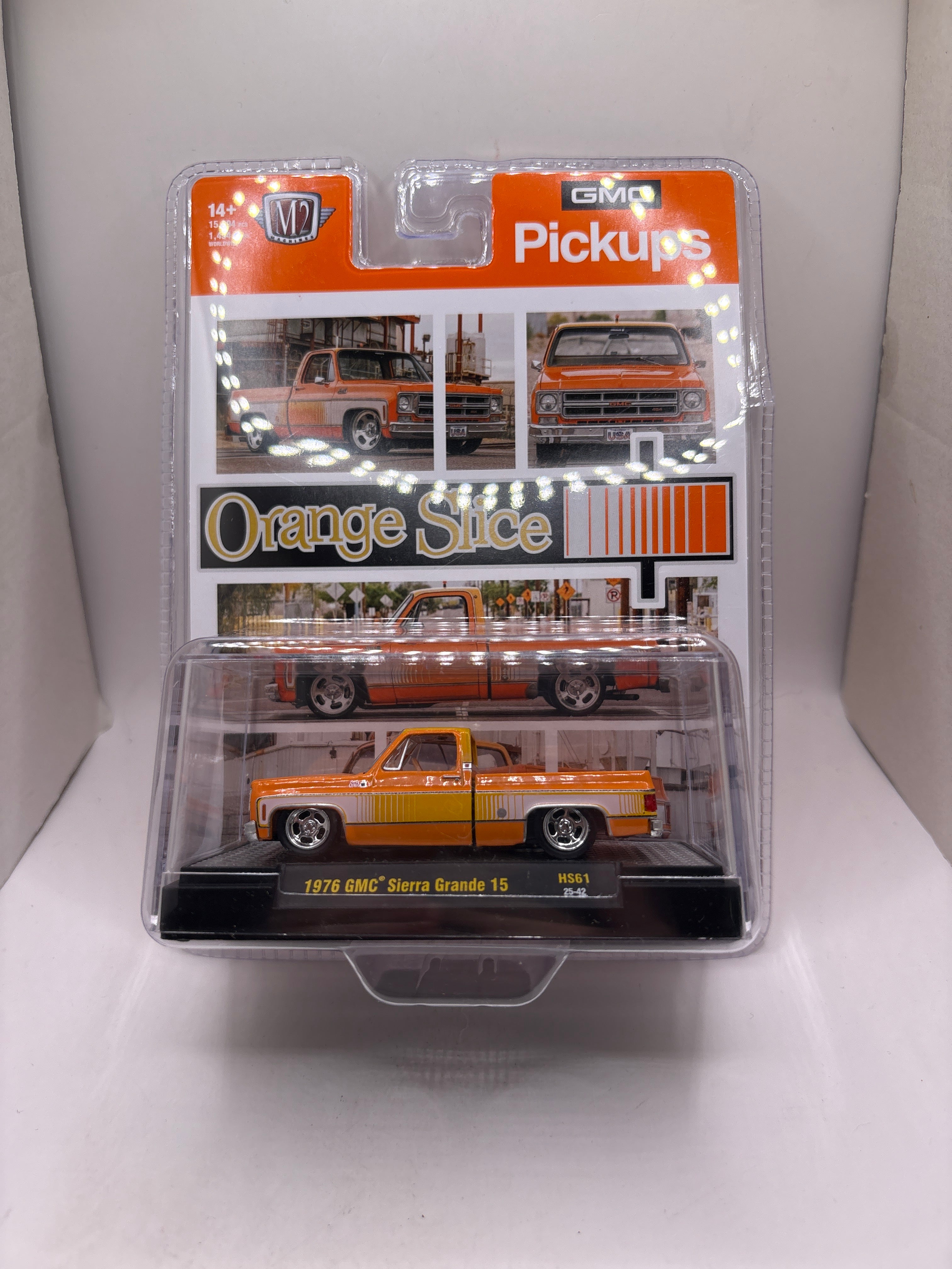 M2 1976 GMC Sierra Grande 15 Diecast orange