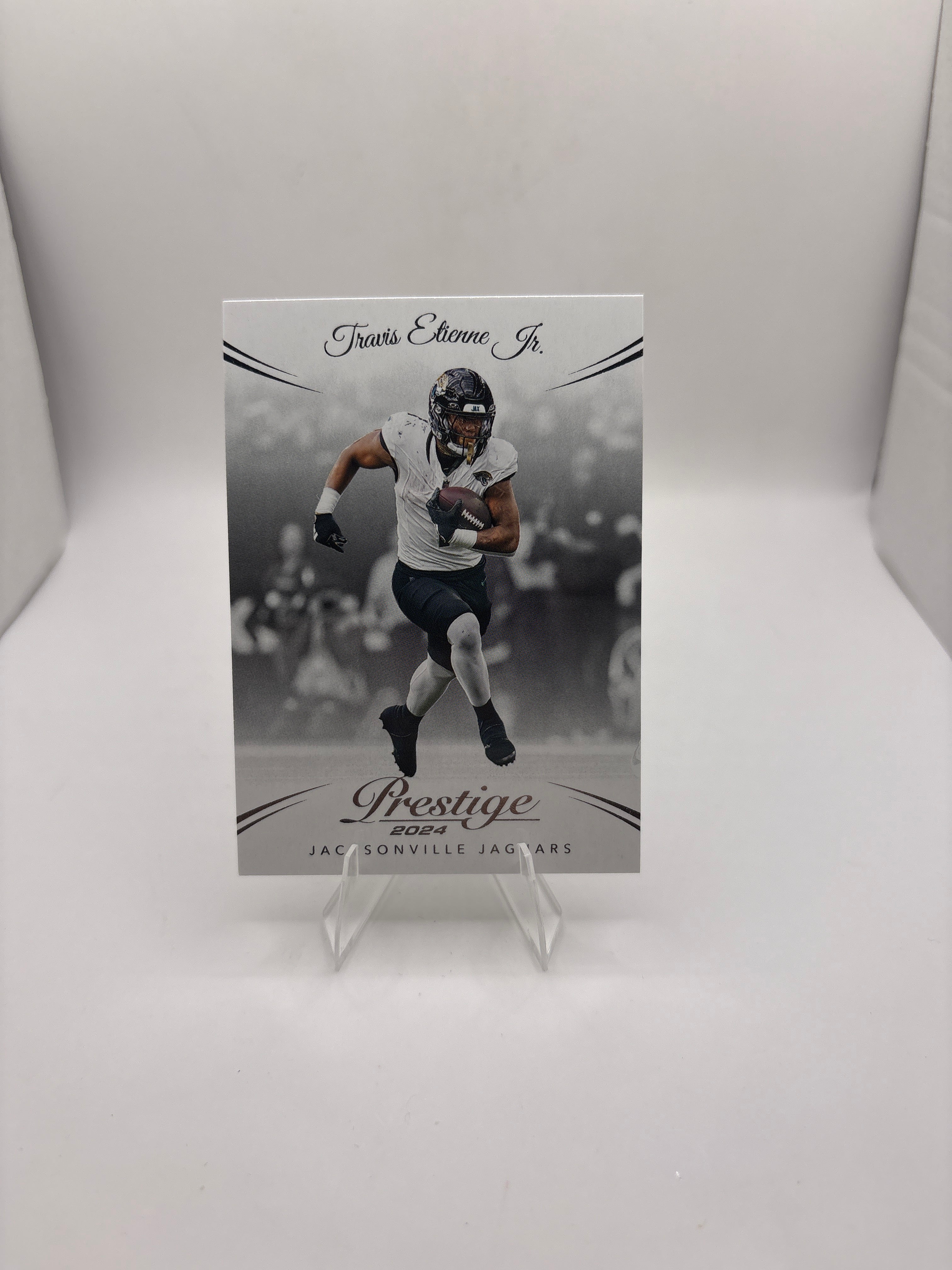 Prestige Travis Etienne JR.