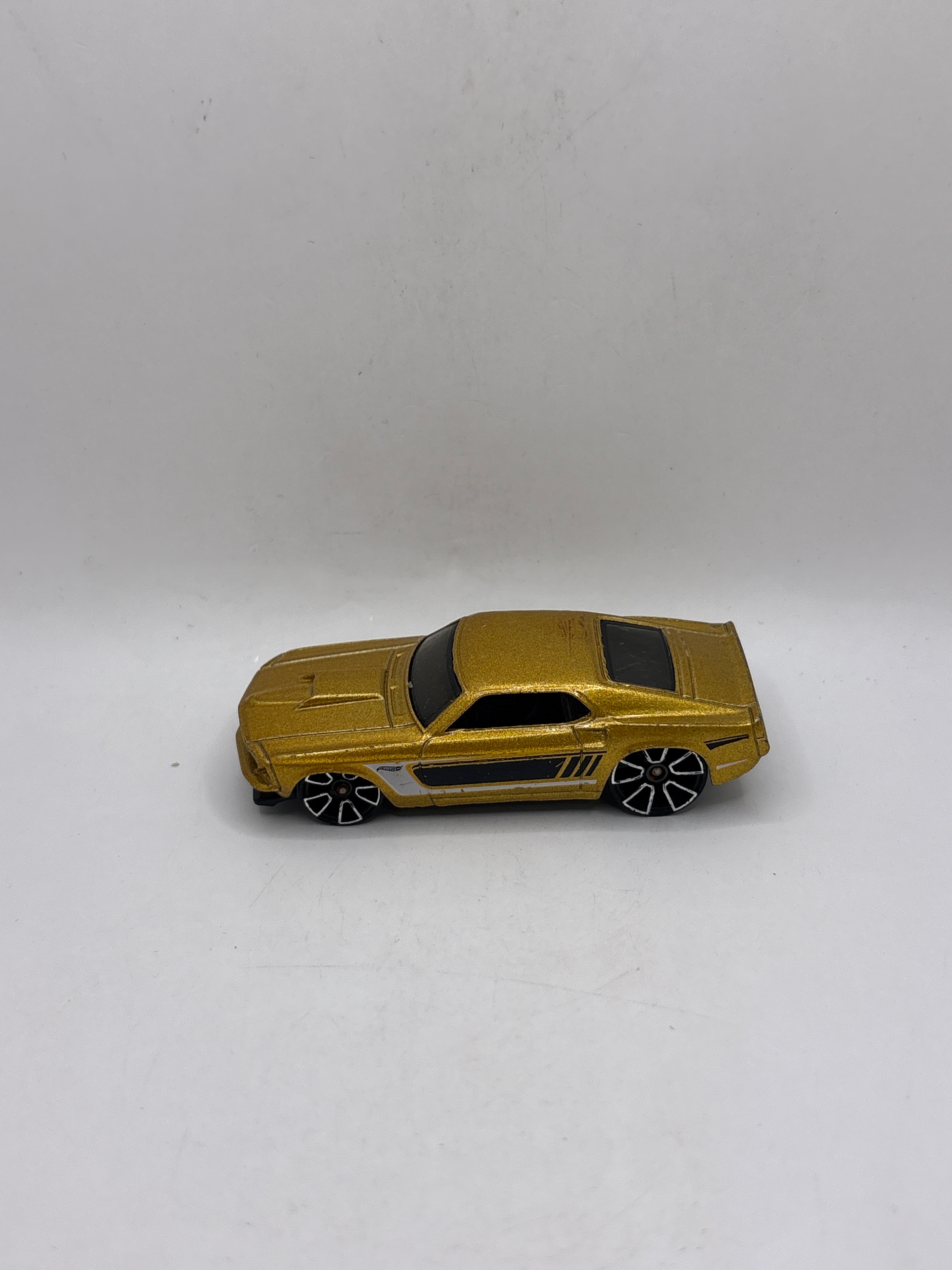 Hot Wheels 69 Ford Mustang Diecast gold