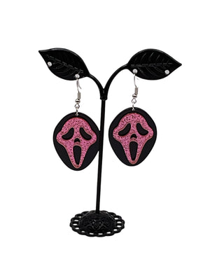 Pink and black scream earrings