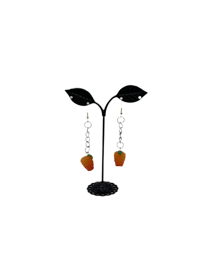 लटकती हुई रास्पबेरी बालियाँ