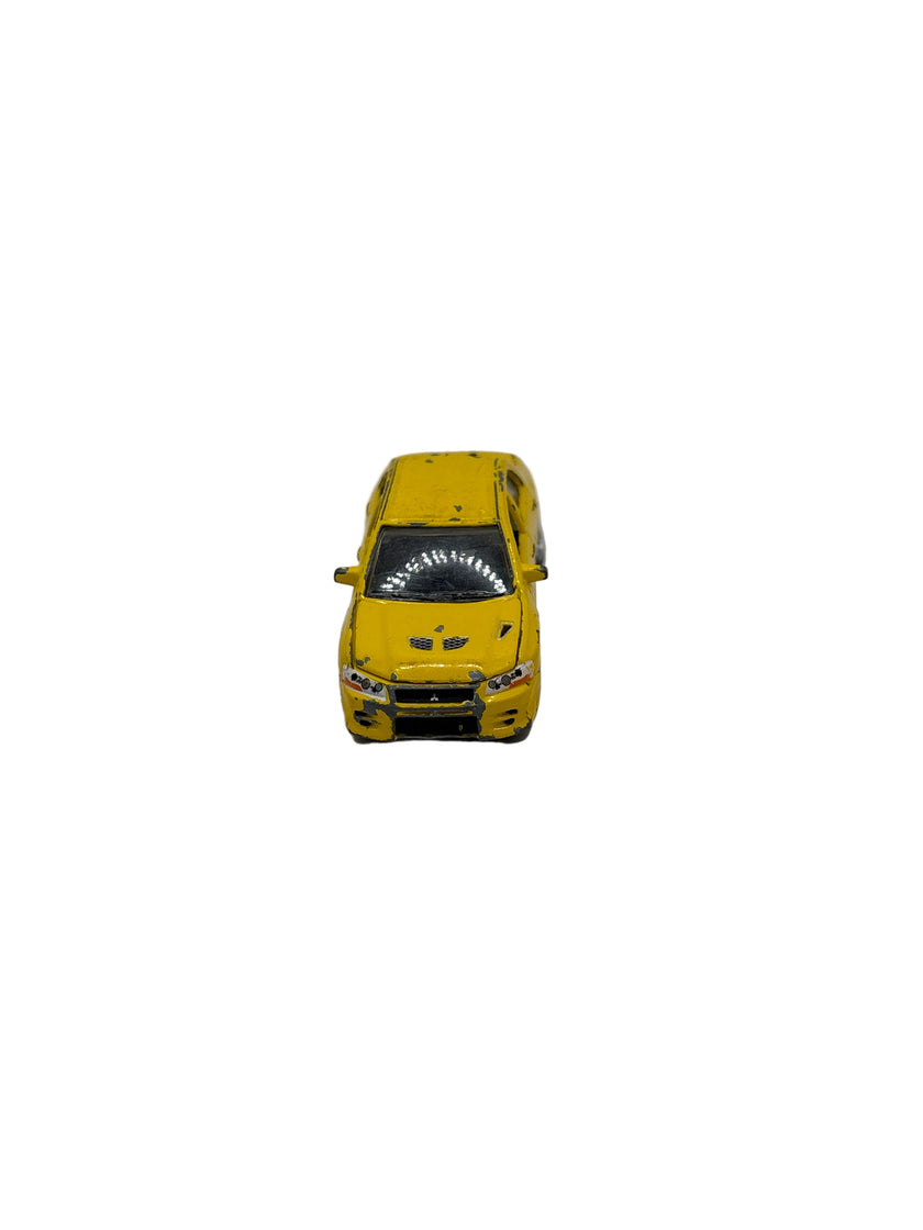 Racing Champions 2002 Mitsubishi Lancer Evolution VII Diecast yellow
