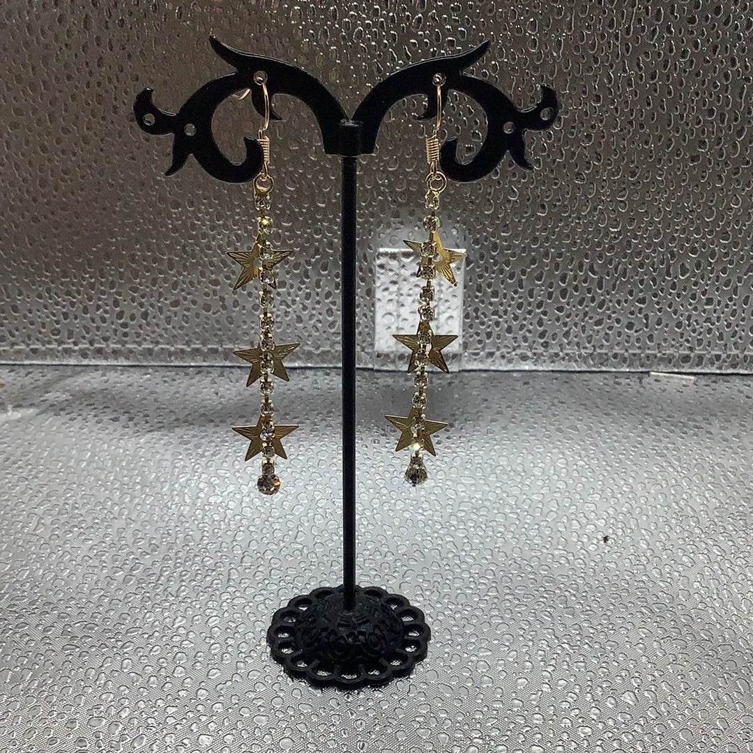 Gold plates dangling stars earrings