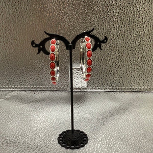 Red hoop earrings