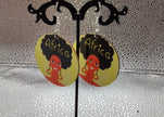 African woman round earrings