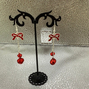 Dangle earrings with bows and bells earrings