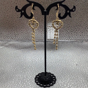 Gold plated shiny and dangling earrings