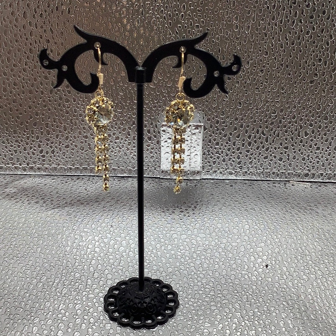 White gem gold and dangling earrings