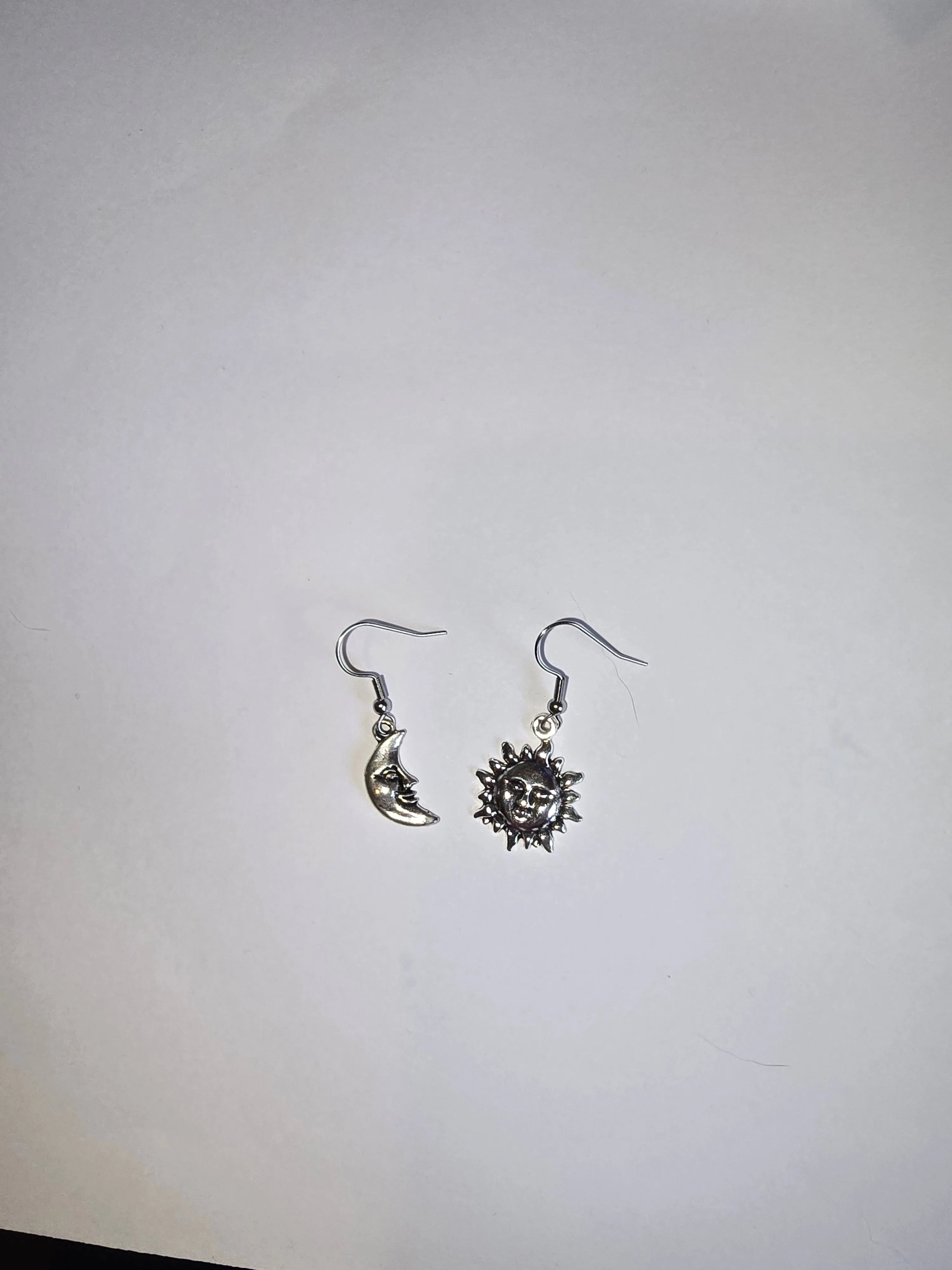 Silver mixed moon and star earrings