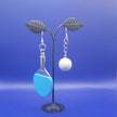 Blue ping pong paddle and ball earrings