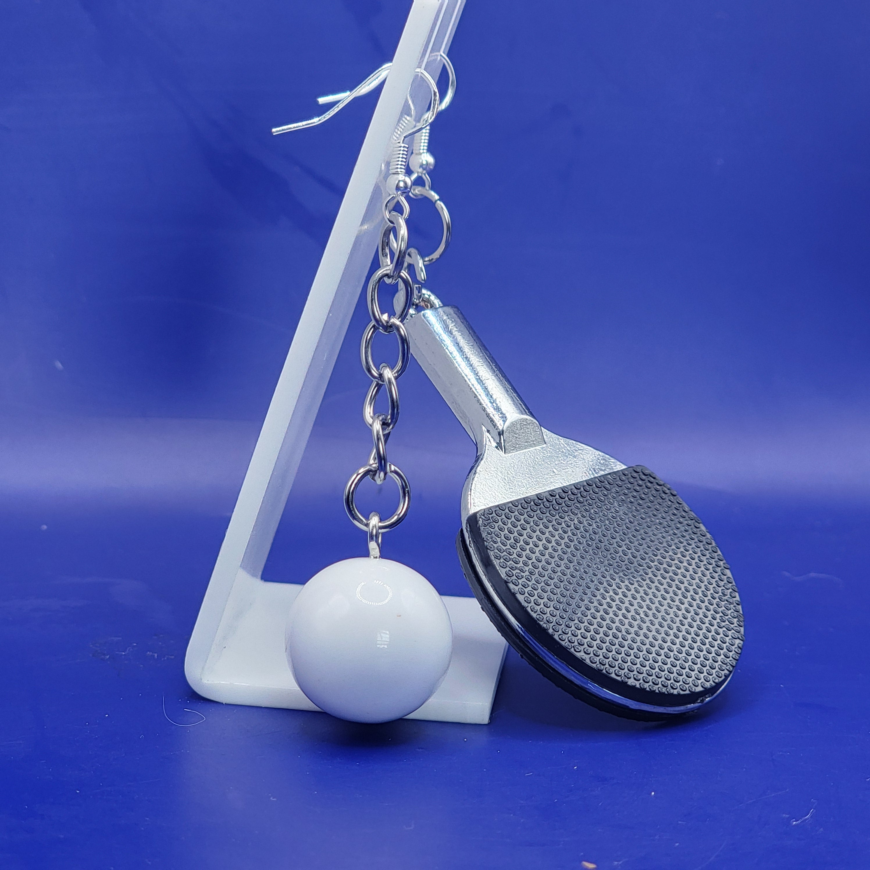 Black ping pong paddle and ball earrings